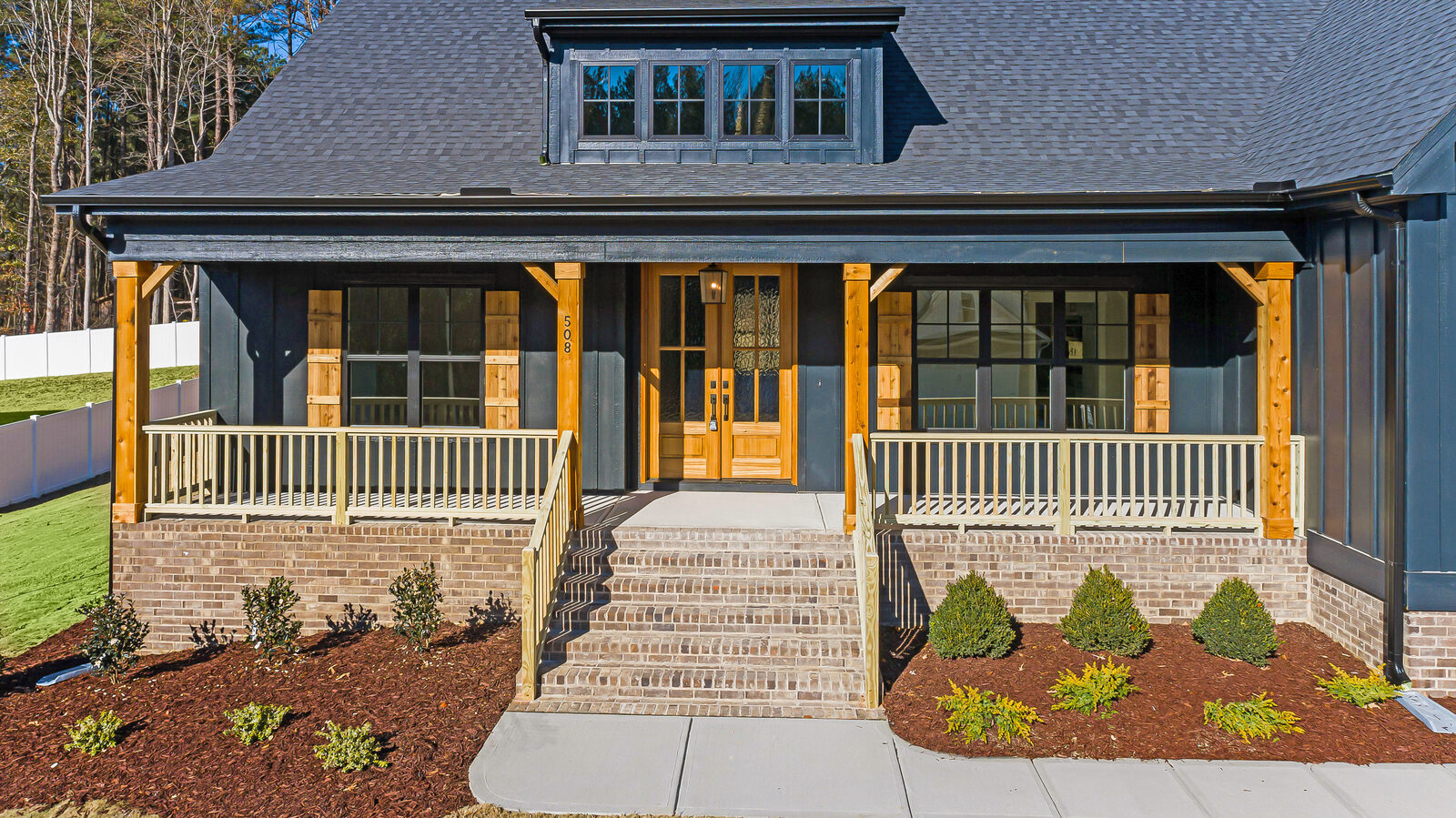 Craftsman front porch of a finished Gemstone custom home
