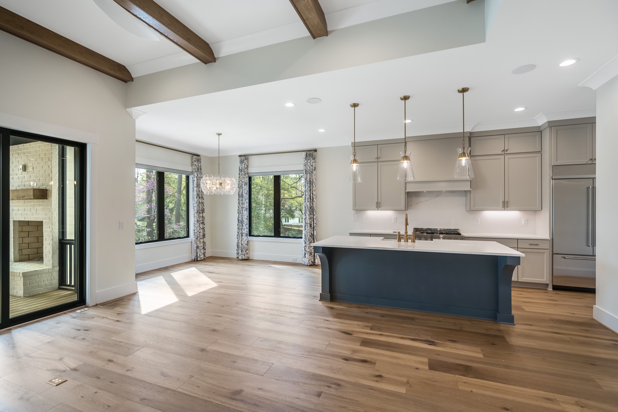 Site-finished hardwood flooring in great room