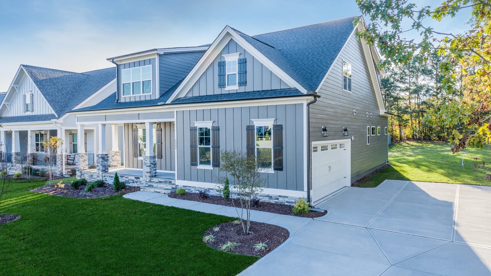 Front elevation of a Gemstone craftsman custom home