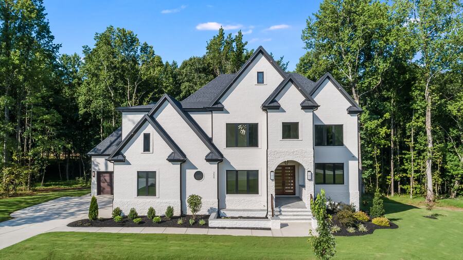 Front elevation of a Gemstone custom home at McLaurin Farms in Fuquay-Varina, NC