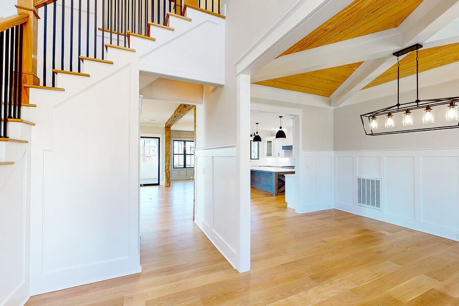 Beamed Dining in The Natalie, a Gemstone Homes custom home
