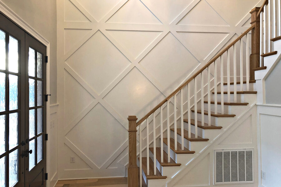 Lattice Staircase in The Onyx III, a Gemstone Homes custom home